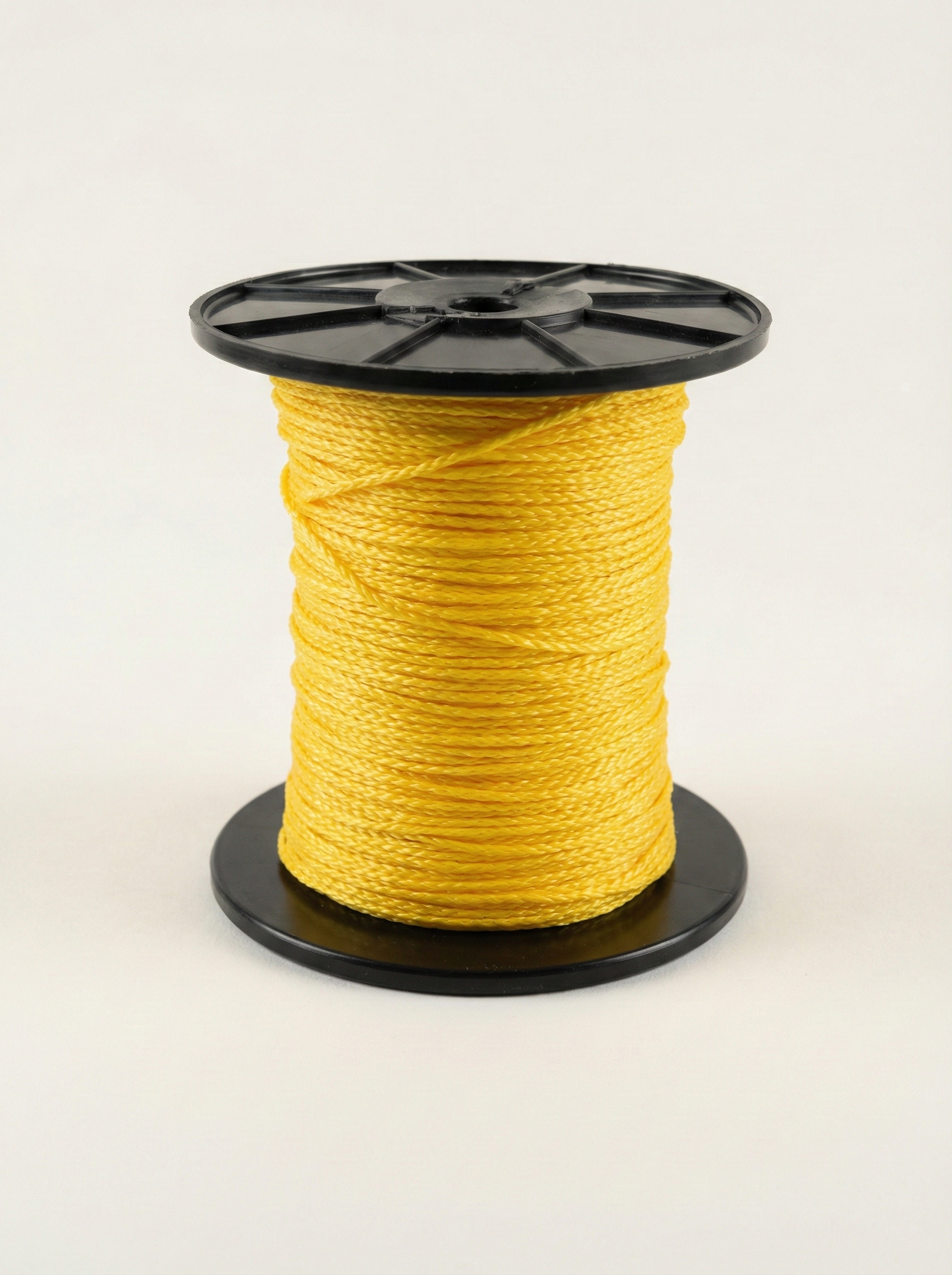 Yellow construction cord on spool